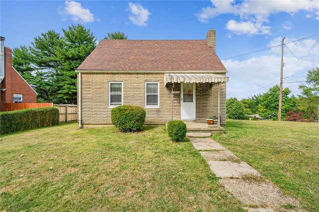 view of front of property with a front lawn