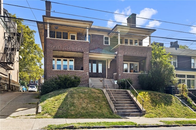 view of property with a balcony