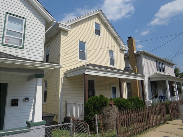 view of property with covered porch