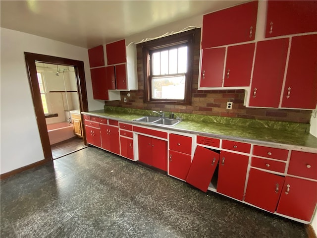 kitchen with decorative backsplash and sink