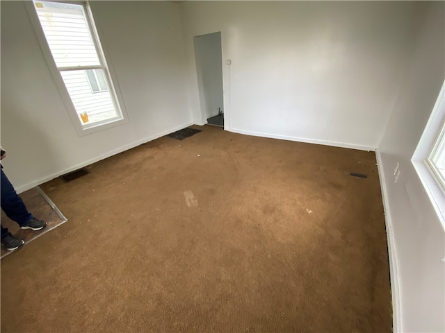 view of carpeted spare room