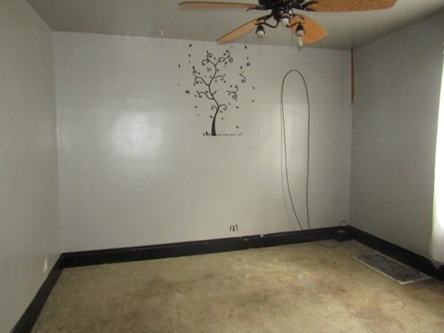 unfurnished room with ceiling fan