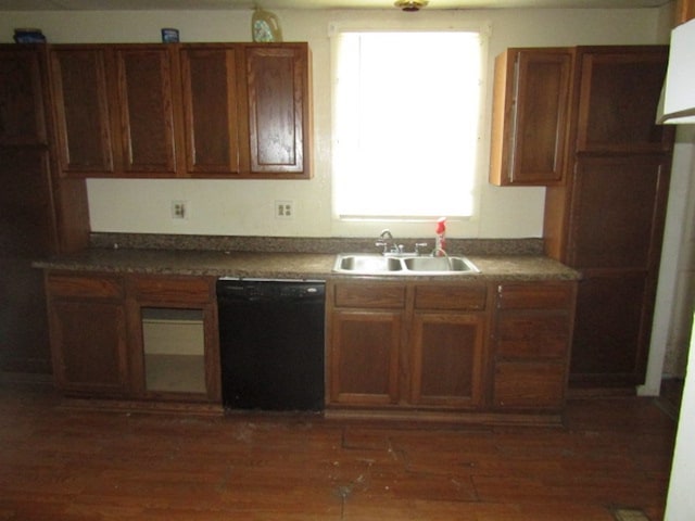 kitchen with dishwasher, sink, and dark hardwood / wood-style flooring