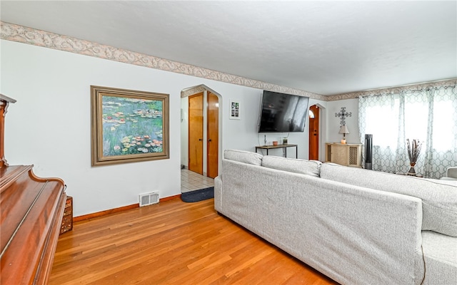 living room with hardwood / wood-style floors