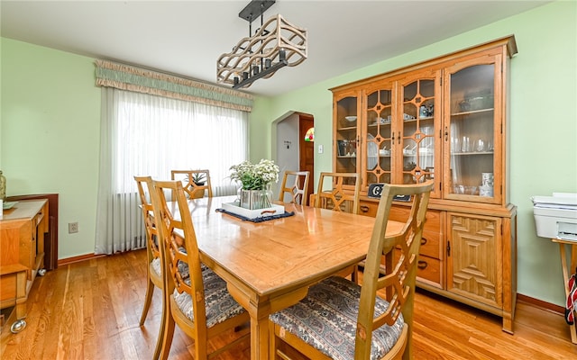 dining room featuring light hardwood / wood-style floors