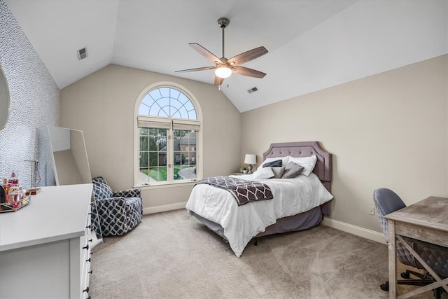 carpeted bedroom with vaulted ceiling and ceiling fan