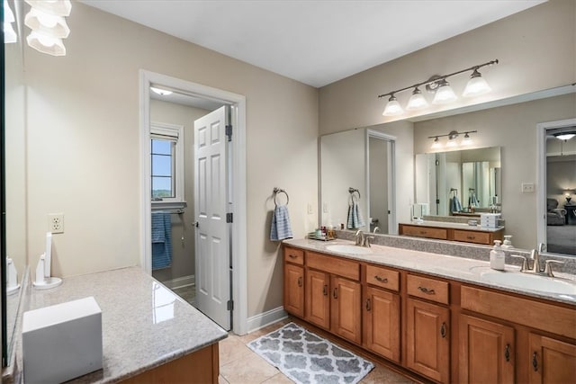 bathroom with vanity and tile patterned floors