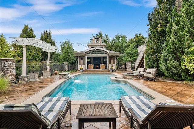 view of pool with a patio, pool water feature, and an outdoor hangout area