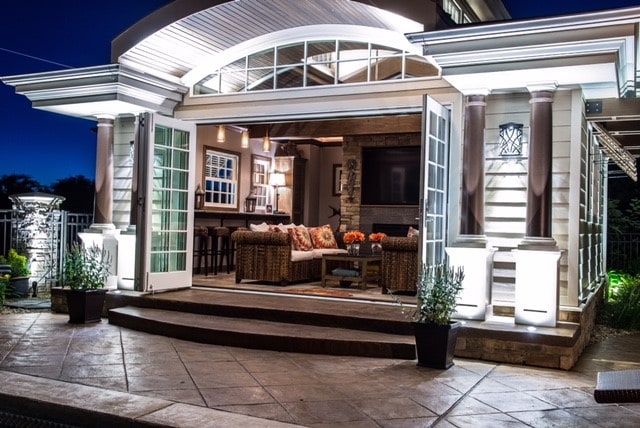 doorway to property featuring a patio and outdoor lounge area