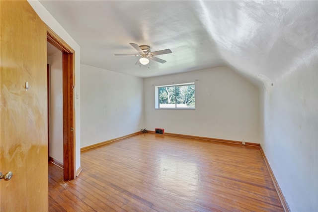 bonus room featuring vaulted ceiling, ceiling fan, and hardwood / wood-style floors