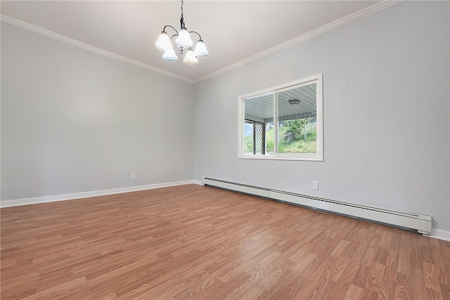 empty room with a baseboard radiator, light hardwood / wood-style floors, an inviting chandelier, and crown molding