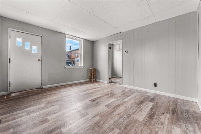 entryway with light hardwood / wood-style floors