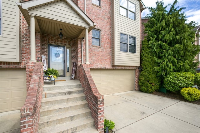 property entrance with a garage