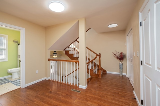 foyer entrance featuring wood-type flooring