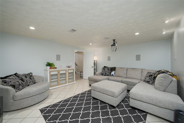 living room featuring light tile patterned floors