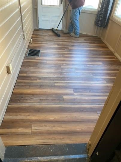 interior details with hardwood / wood-style flooring