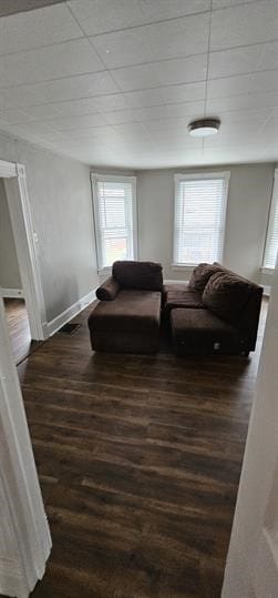 living room with dark hardwood / wood-style flooring