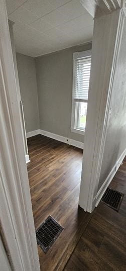 interior space with dark hardwood / wood-style floors