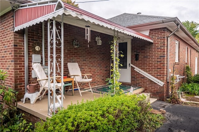 1820 N Hermitage Rd, Hermitage, PA 16148 - exterior space with a patio area, brick siding, and roof with shingles