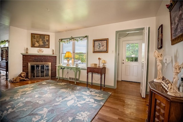 1820 N Hermitage Rd, Hermitage, PA 16148 - interior space with visible vents, baseboards, wood finished floors, and a fireplace
