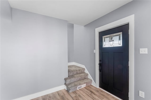 foyer entrance featuring light wood-type flooring