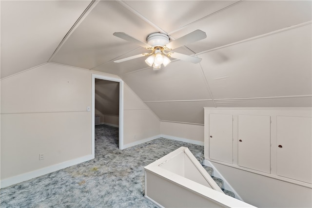 bonus room with ceiling fan, light colored carpet, and lofted ceiling