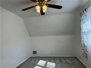 additional living space with vaulted ceiling and ceiling fan