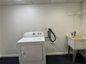 washroom with washer / dryer