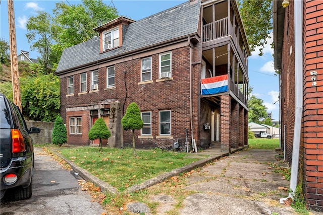 view of front of property with cooling unit