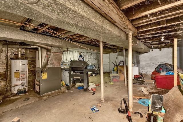 basement with heating unit and water heater