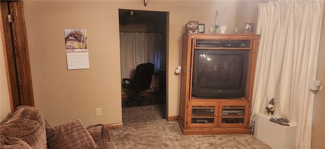 hall with light colored carpet