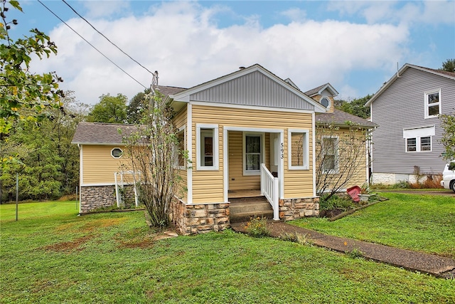 view of front of home with a front yard