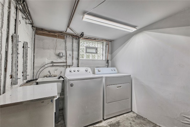 laundry room with independent washer and dryer