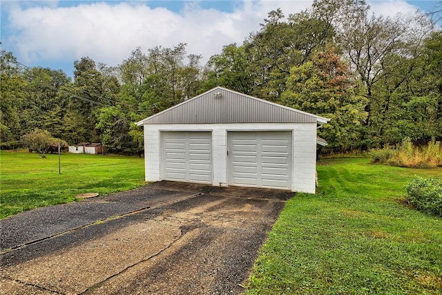 garage with a lawn