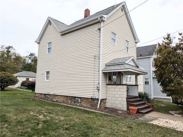 exterior space with a lawn