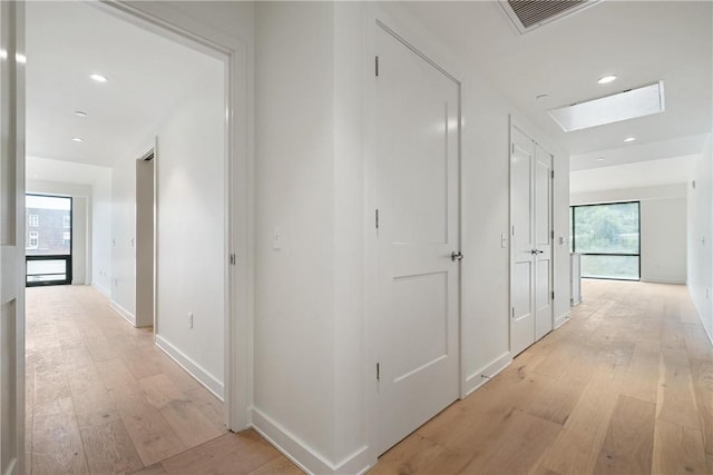 2330 Penn Ave Unit 302, Downtown Pgh, PA 15222 - corridor with light wood finished floors, a skylight, healthy amount of natural light, baseboards, and recessed lighting