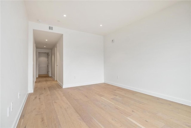 2330 Penn Ave Unit 302, Downtown Pgh, PA 15222 - spare room featuring light wood-type flooring, recessed lighting, and baseboards