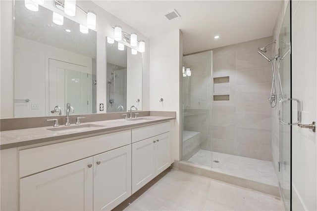 2330 Penn Ave Unit 302, Downtown Pgh, PA 15222 - bathroom with a stall shower, double vanity, recessed lighting, and tile patterned flooring
