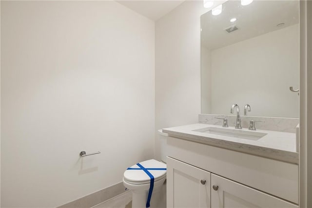 2330 Penn Ave Unit 302, Downtown Pgh, PA 15222 - bathroom with toilet, vanity, and baseboards