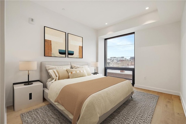 2330 Penn Ave Unit 302, Downtown Pgh, PA 15222 - bedroom with light wood finished floors, recessed lighting, and baseboards