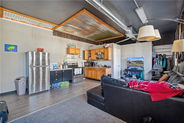 living room with dark hardwood / wood-style flooring