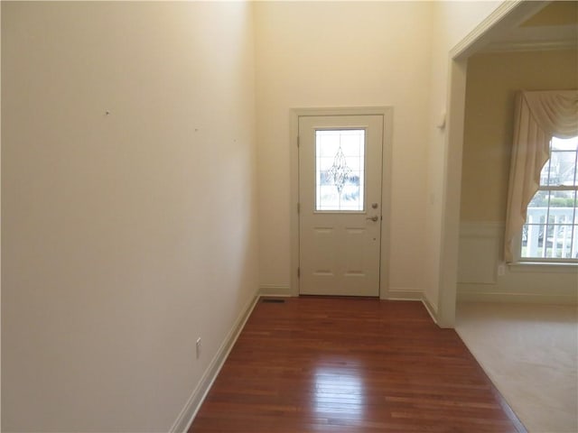 doorway to outside featuring dark hardwood / wood-style flooring