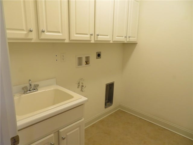 laundry area with cabinets, hookup for a washing machine, electric dryer hookup, and sink