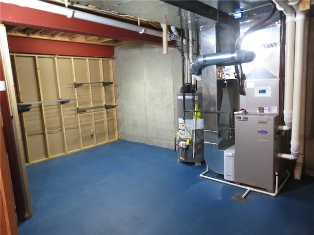 utility room with gas water heater