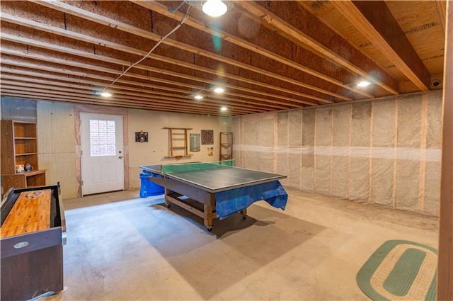 recreation room featuring concrete floors