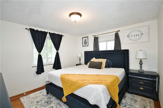 bedroom featuring hardwood / wood-style floors