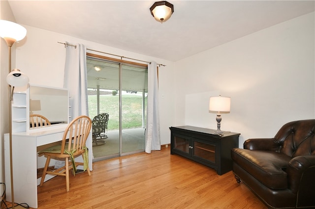 living area with light hardwood / wood-style floors