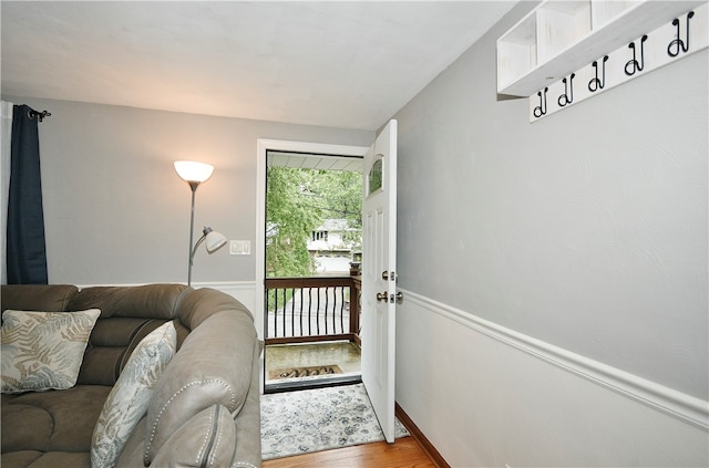 entryway with hardwood / wood-style flooring