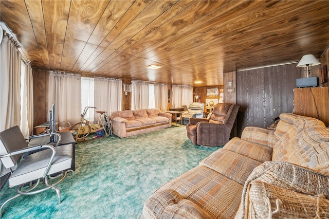 living room with carpet floors, wood ceiling, and wooden walls