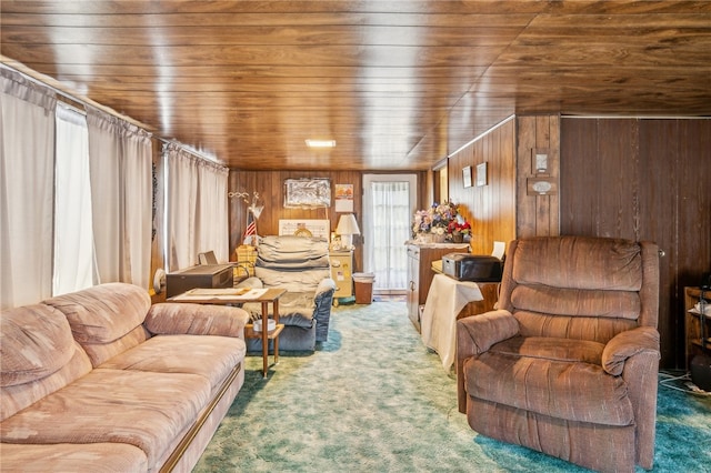 living room with carpet floors, wood ceiling, and wood walls